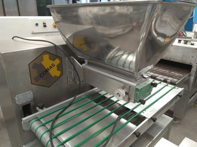 Muffin depositing machine